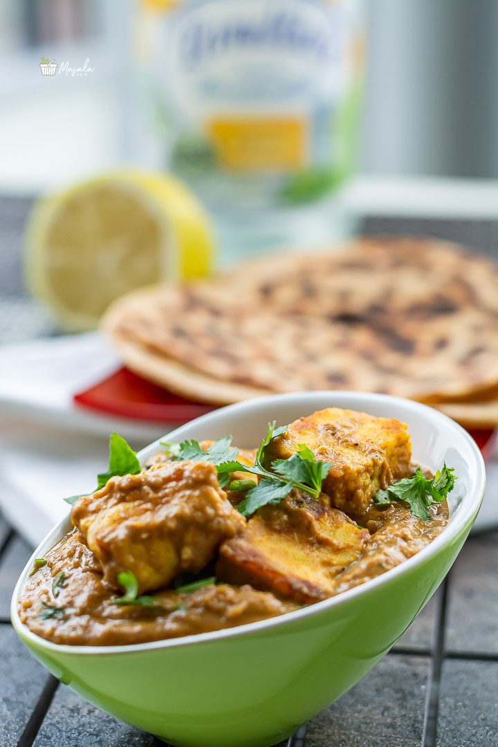 Paneer gravy served with parathas.