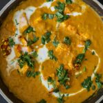 Paneer butter masala served in a pan