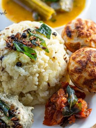 Ven Pongal served with Chutney, sambar and paniyaram