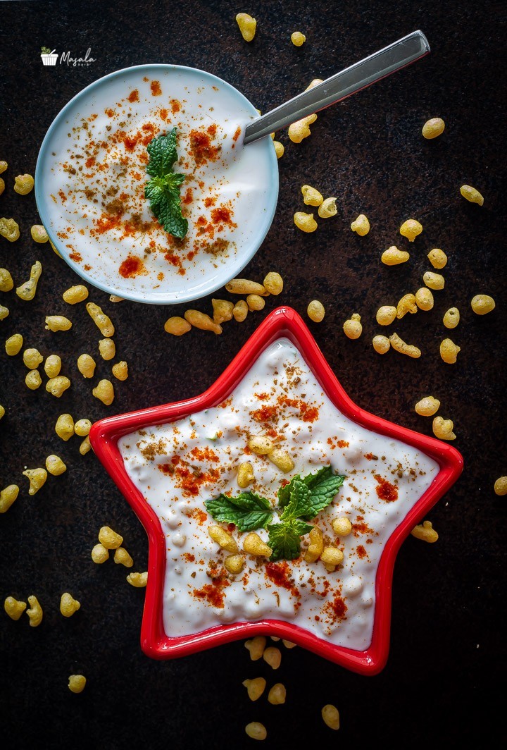 Boondi raita mixed in a bowl.