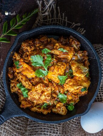 Egg Bhurji Masala served in a cast iron pan