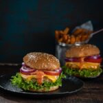 Aloo Tikki Burger served with masala french fries.