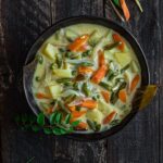 Kerala Vegetable Stew Recipe served in a black bowl.