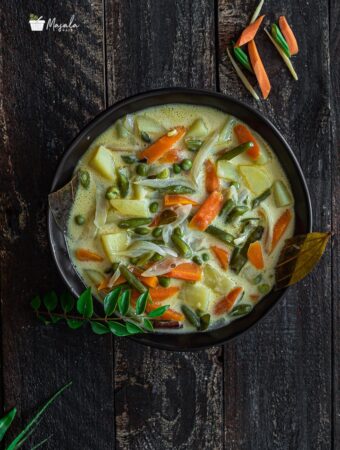 Kerala Vegetable Stew Recipe served in a black bowl.
