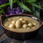 Undralla Payasam served in a black bowl.