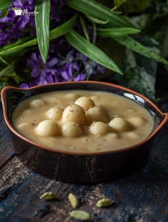 Undralla Payasam served in a black bowl.