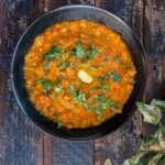 Pav Bhaji Recipe Instant Pot served in a black plate.