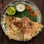 Instant Rava Dosa served with an array of condiments