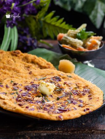 Kara Adai dosa served with jaggery & vegetable stew.