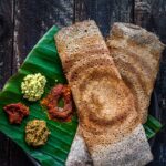 Crispy Ragi Dosa Recipe | Finger Millet Dosa served with an assortment of chutneys and gun powder.