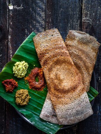 Crispy Ragi Dosa Recipe | Finger Millet Dosa served with an assortment of chutneys and gun powder.