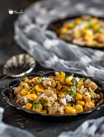 Corn Chickpea Salad - Sweet Corn & Chickpea Sundal served in a plate.