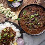 Rajma Chawal, punjabii rajma masala served with basmati rice with some raw onion & lemon wedges.