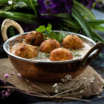 Malai Kofta Recipe Restaurant Style served in a copper kadai