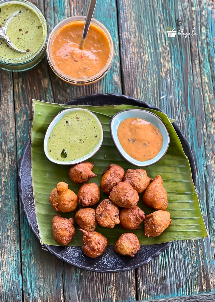 Mysore bonda or goli baje served with coconut chutney & ginger chutney.