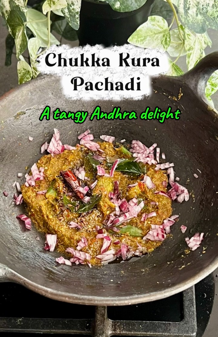 Chukka kura Pachadi served in a black mud pan.